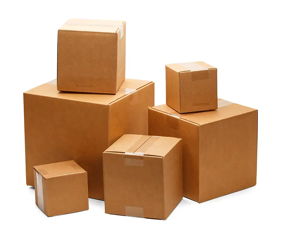An assortment of various-sized cardboard moving boxes sealed with tape, available through Moscardelli Moving & Storage in Springfield IL